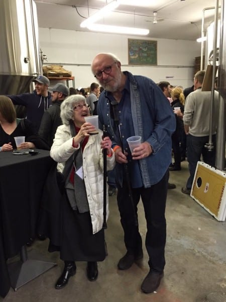 Rita Kohn, author, Indiana beer expert, and conference panelist, offers cheers to John Hill, founder of Broad Ripple Brewpub, Indiana's oldest continuously operating brewery.