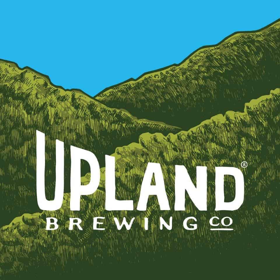 A square featuring green tree covered hills in front of a blue sky with the text Upland Brewing Co.