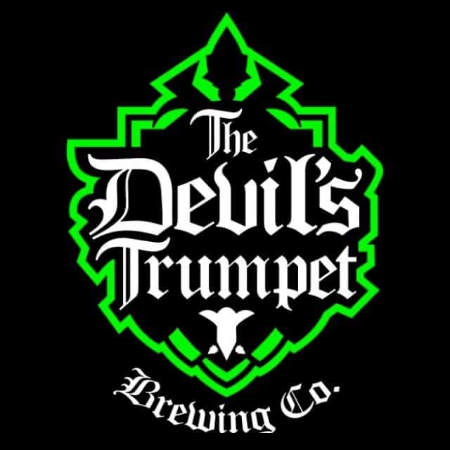 A green Badge on a Black Square with white text reading The Devil's Trumpet Brewing Co.
